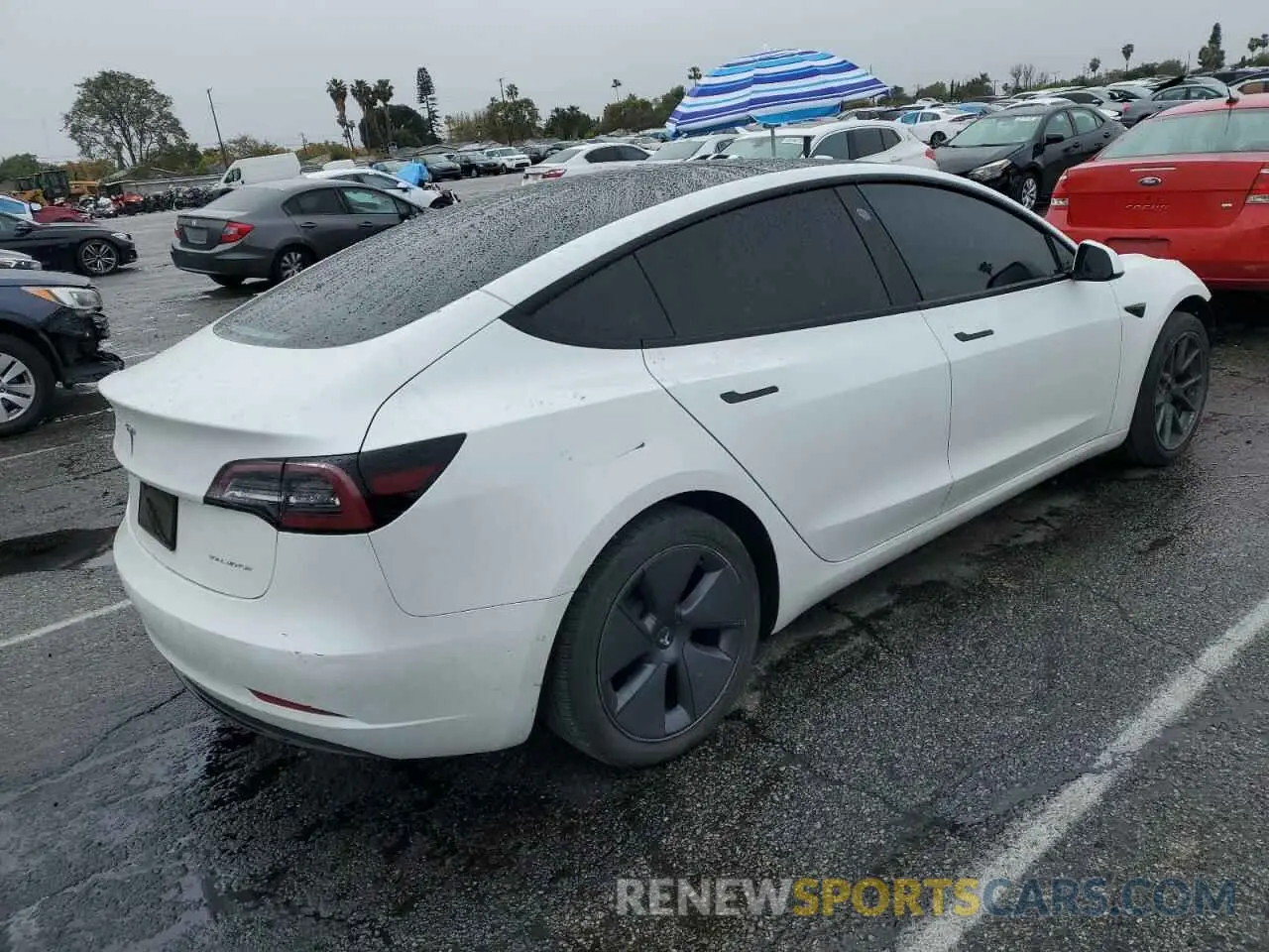 3 Photograph of a damaged car 5YJ3E1EB4NF212763 TESLA MODEL 3 2022