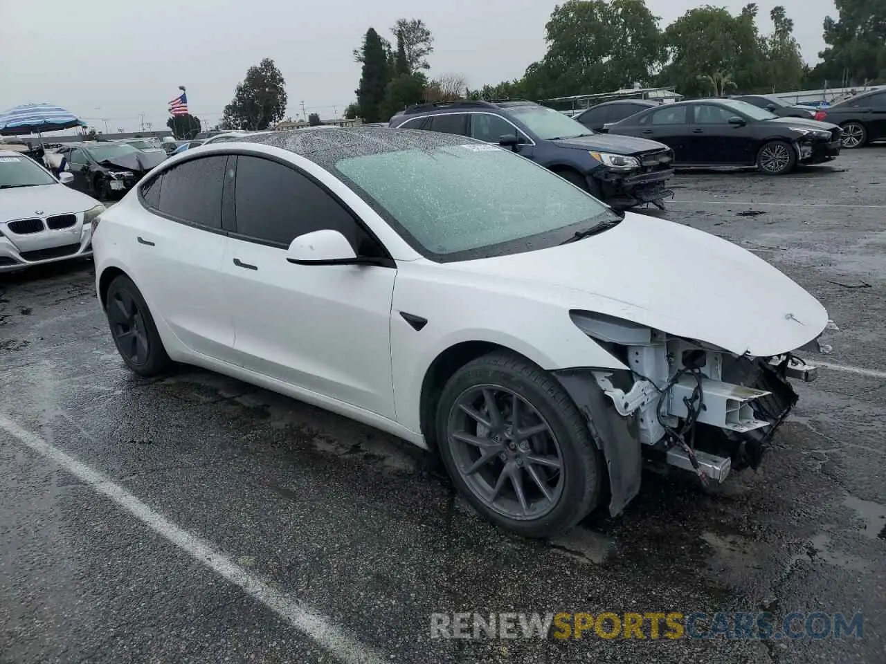 4 Photograph of a damaged car 5YJ3E1EB4NF212763 TESLA MODEL 3 2022
