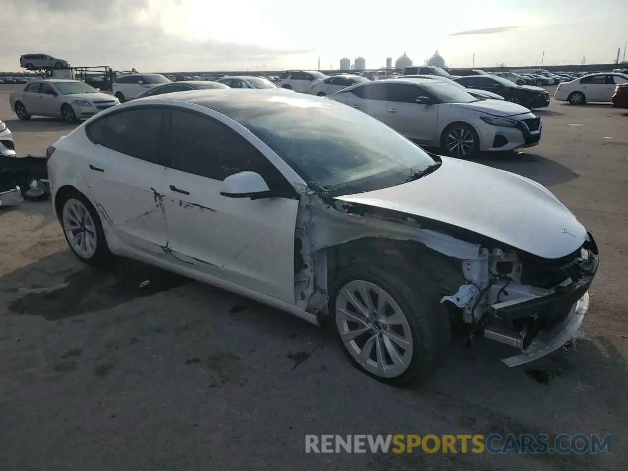 4 Photograph of a damaged car 5YJ3E1EB4NF238716 TESLA MODEL 3 2022