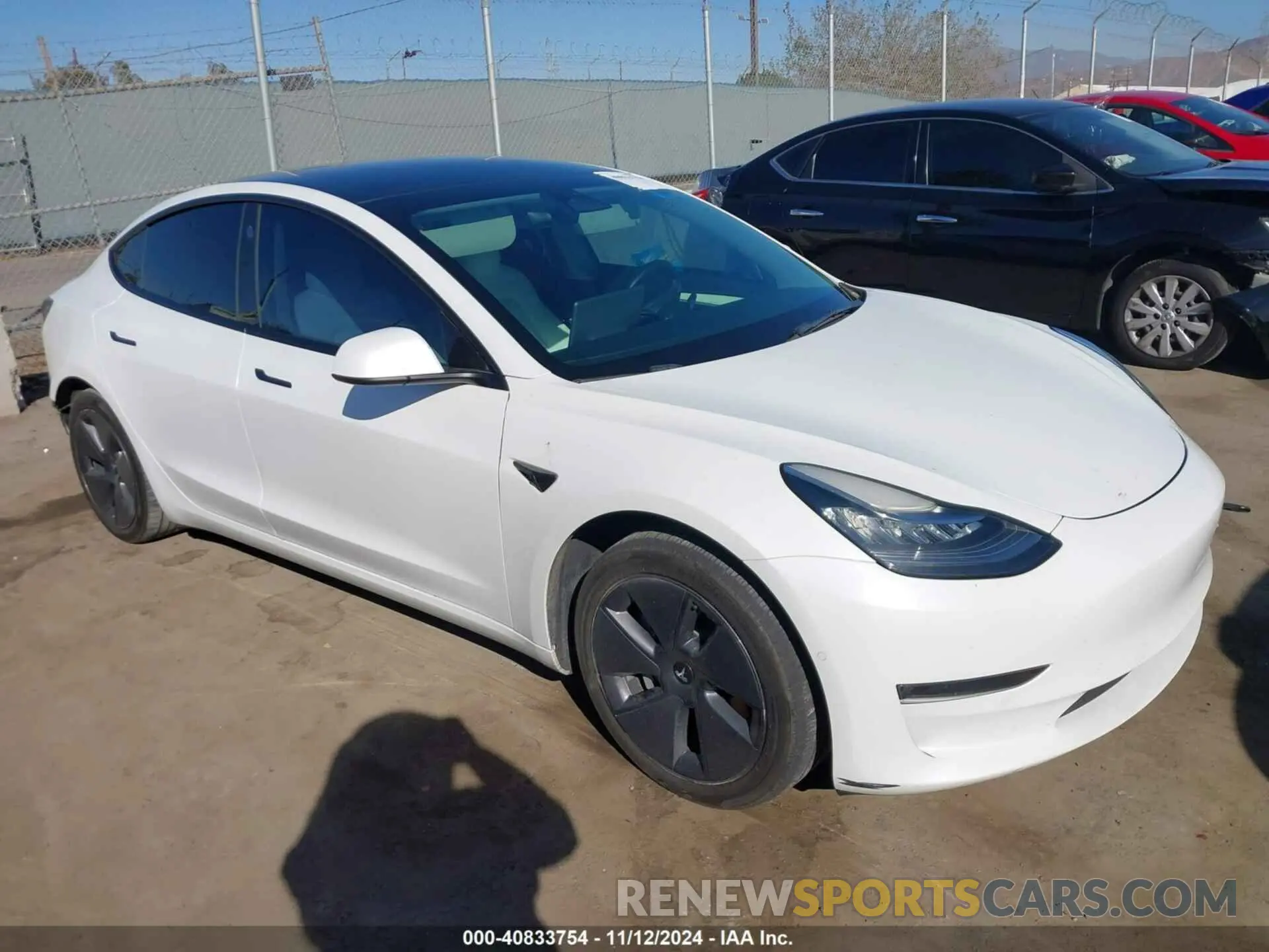 1 Photograph of a damaged car 5YJ3E1EB4NF242894 TESLA MODEL 3 2022