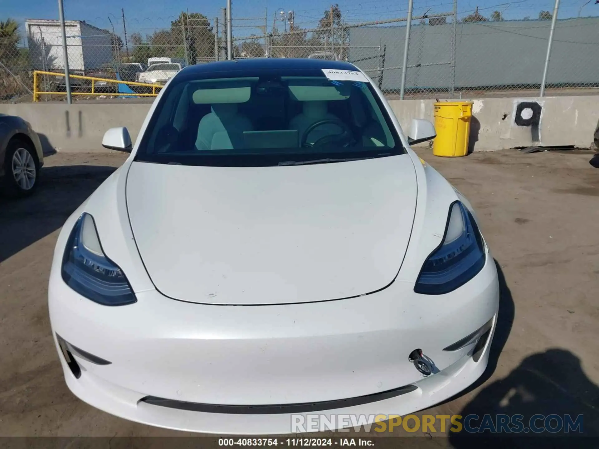 12 Photograph of a damaged car 5YJ3E1EB4NF242894 TESLA MODEL 3 2022