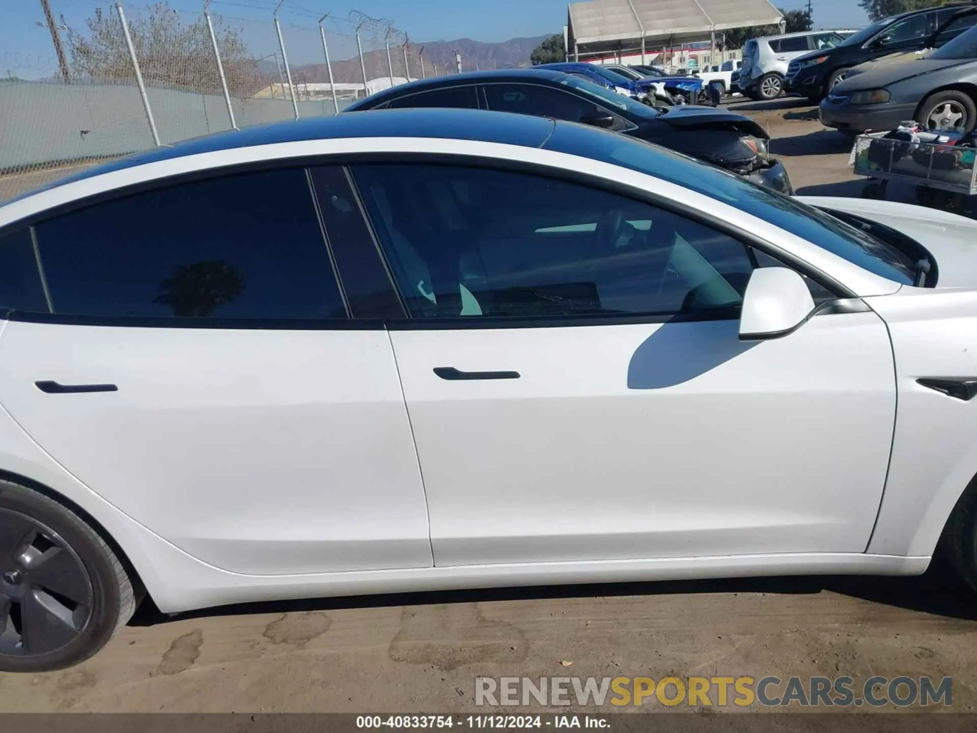 13 Photograph of a damaged car 5YJ3E1EB4NF242894 TESLA MODEL 3 2022