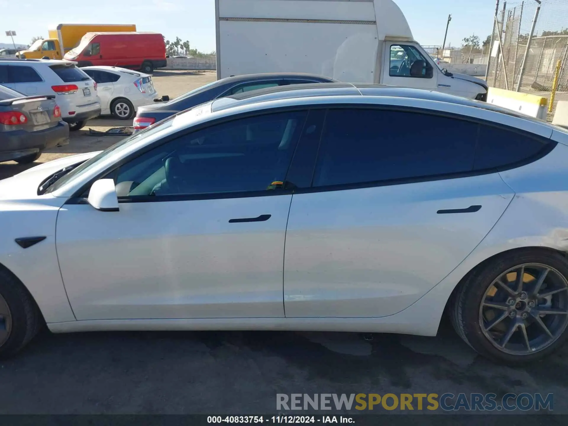 14 Photograph of a damaged car 5YJ3E1EB4NF242894 TESLA MODEL 3 2022