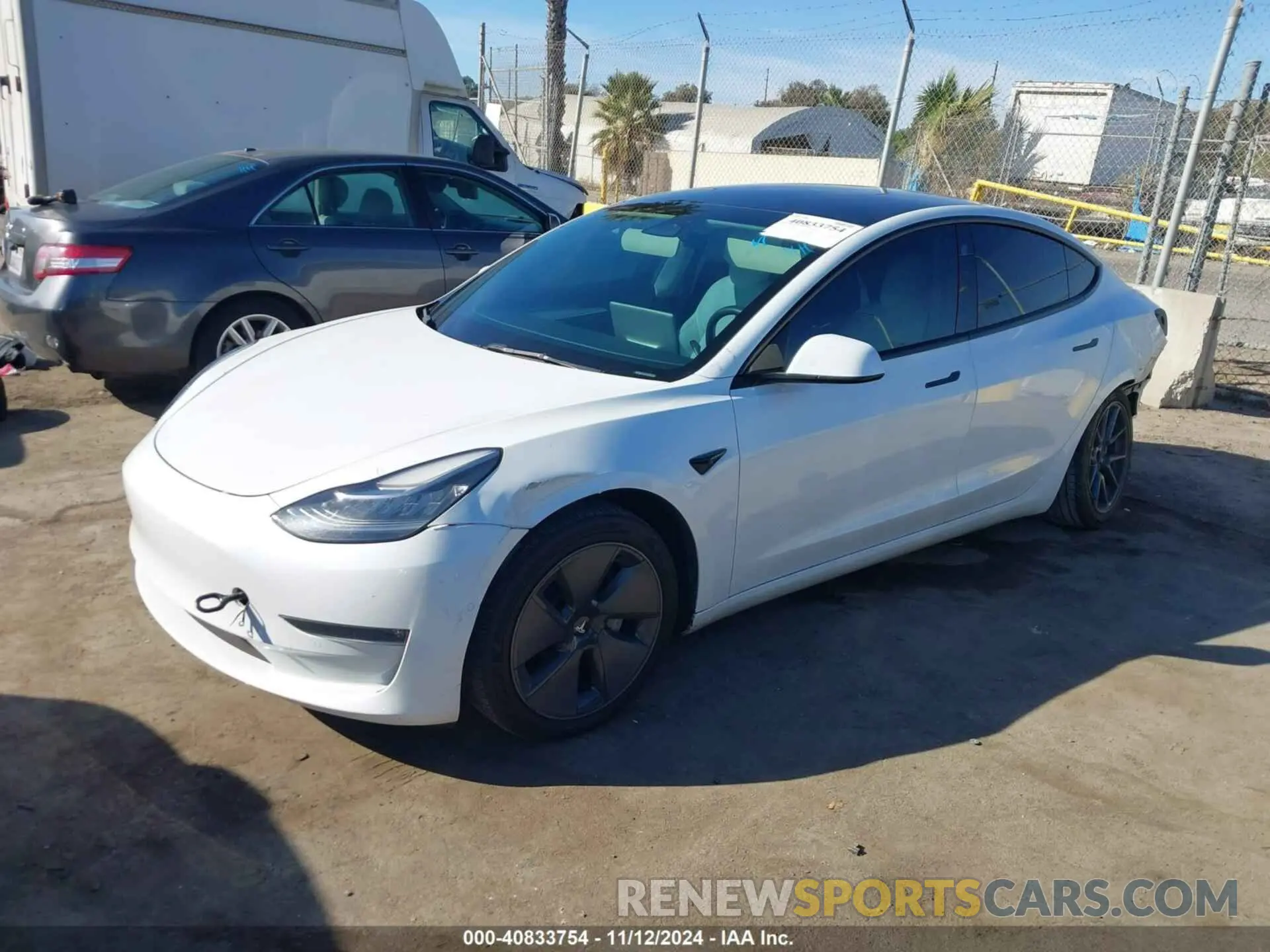 2 Photograph of a damaged car 5YJ3E1EB4NF242894 TESLA MODEL 3 2022