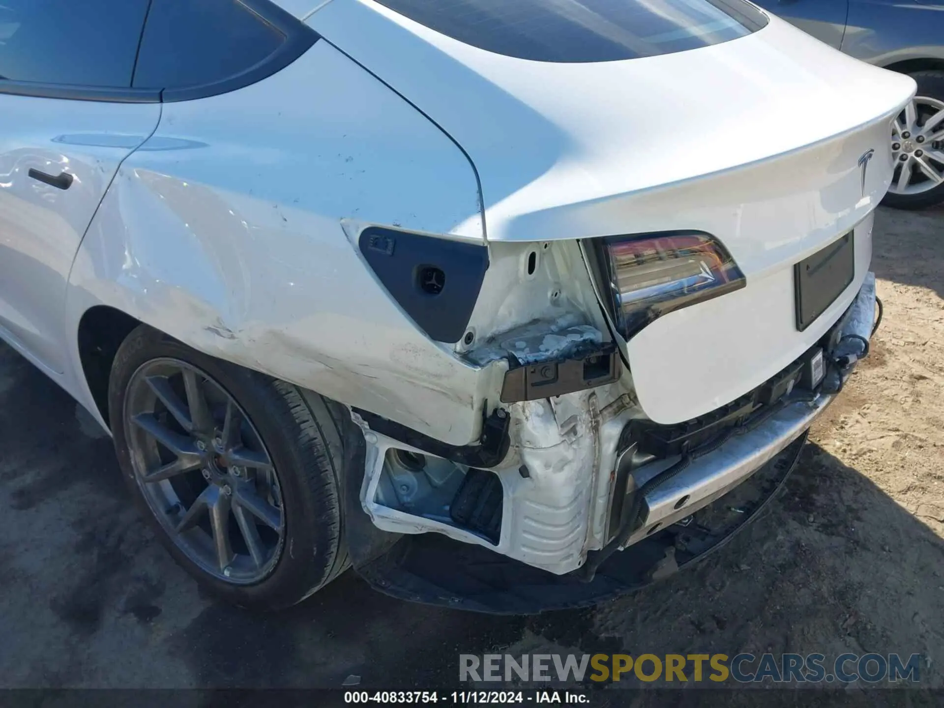 6 Photograph of a damaged car 5YJ3E1EB4NF242894 TESLA MODEL 3 2022