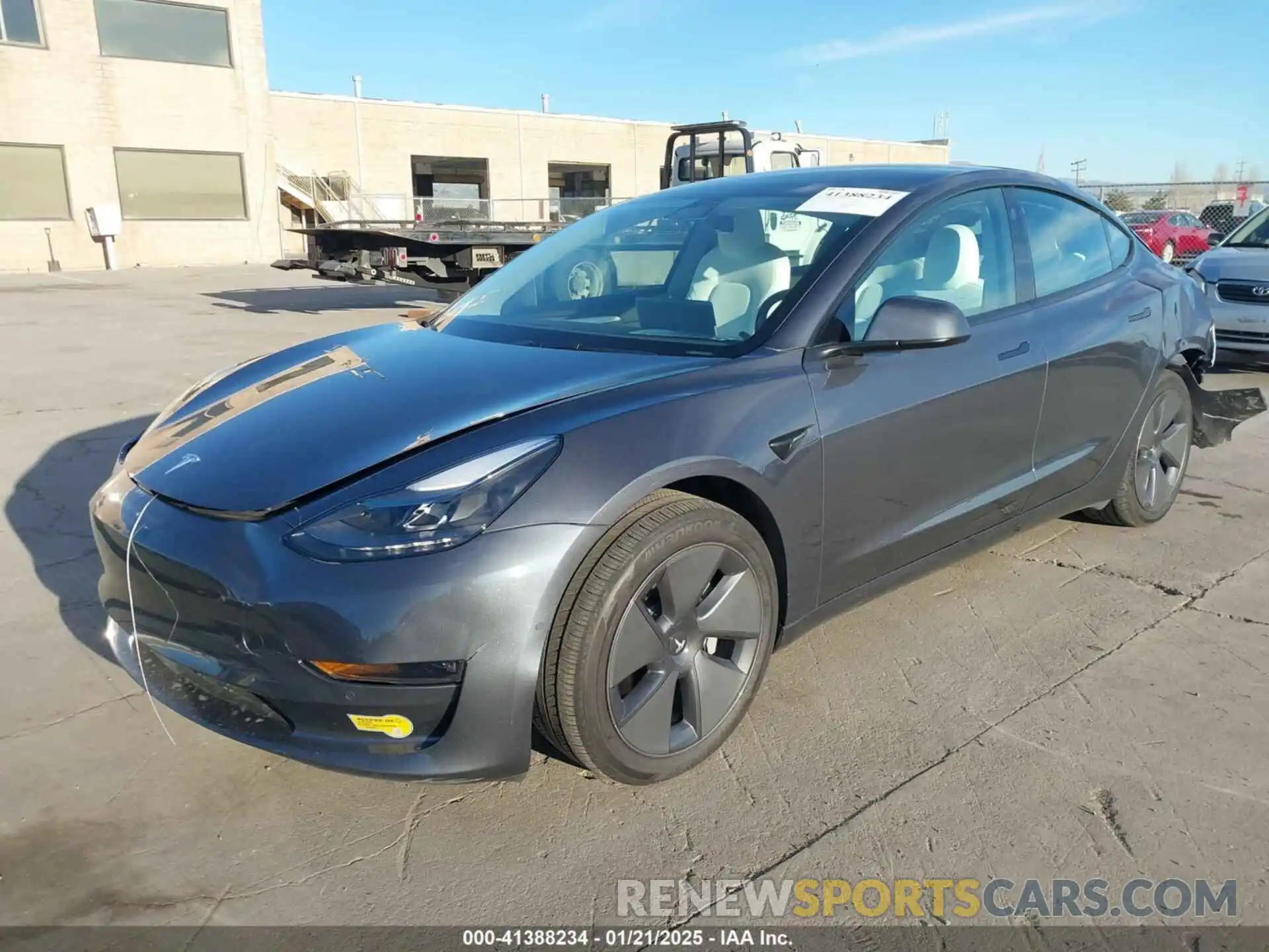 2 Photograph of a damaged car 5YJ3E1EB4NF293635 TESLA MODEL 3 2022