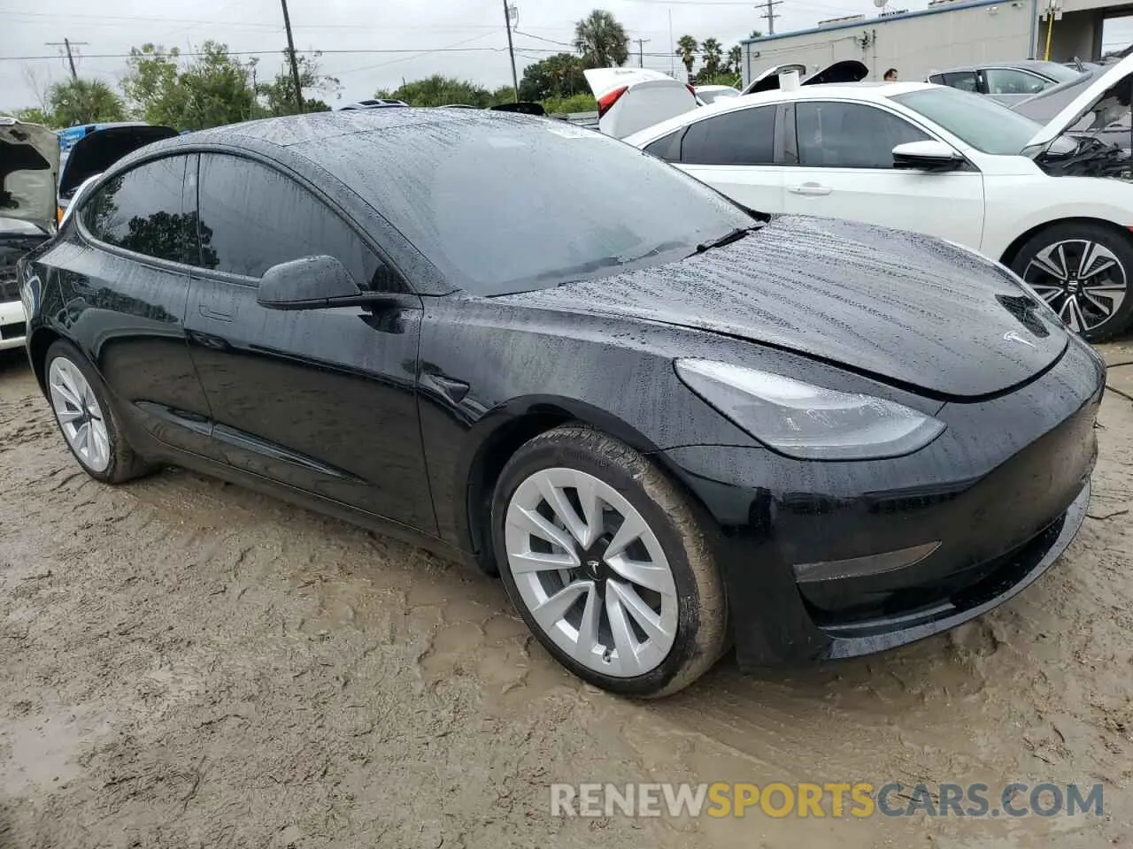 4 Photograph of a damaged car 5YJ3E1EB4NF321465 TESLA MODEL 3 2022