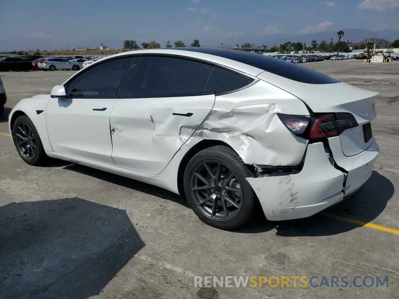 2 Photograph of a damaged car 5YJ3E1EB4NF332403 TESLA MODEL 3 2022