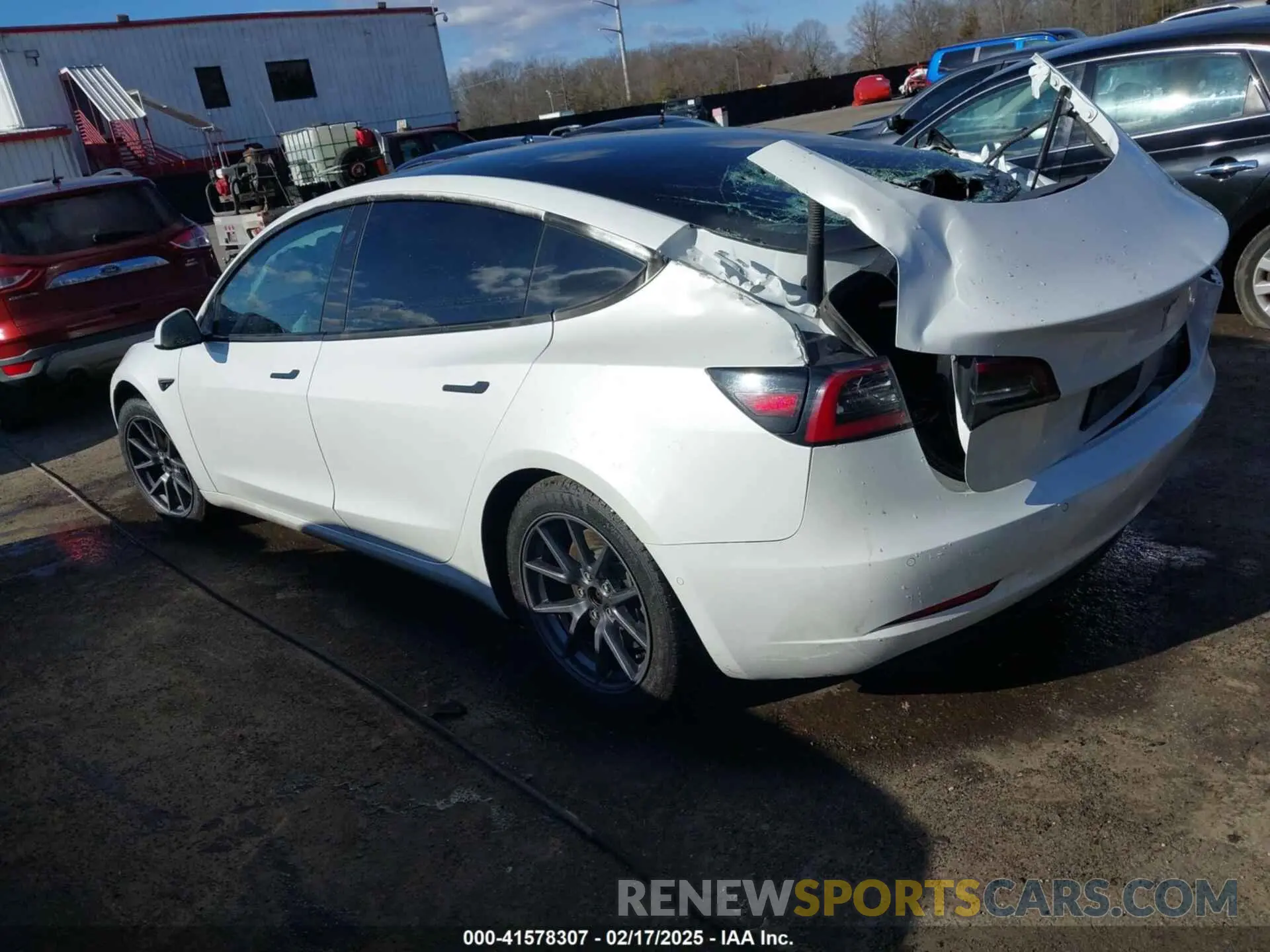 3 Photograph of a damaged car 5YJ3E1EB4NF334877 TESLA MODEL 3 2022