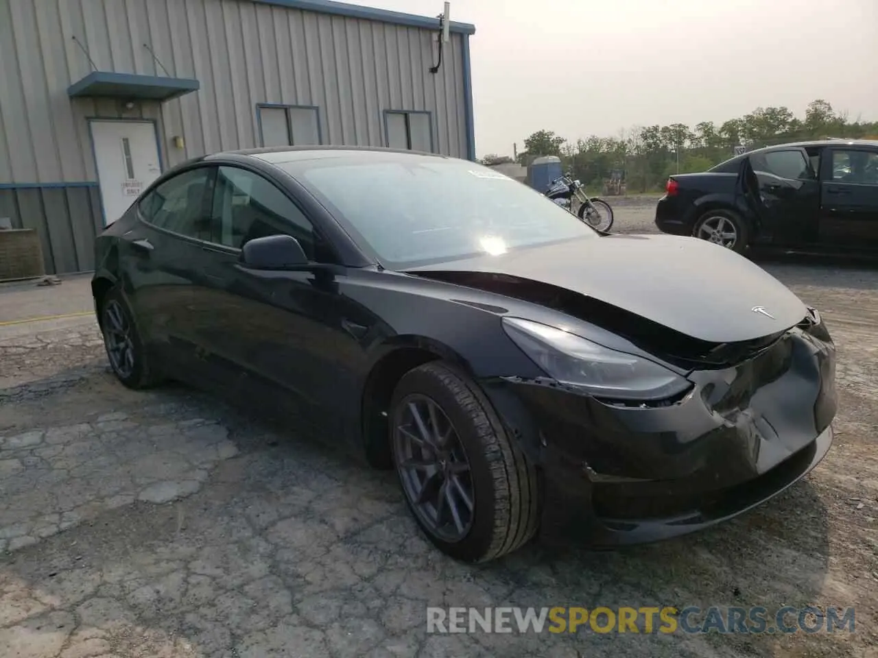 4 Photograph of a damaged car 5YJ3E1EB4NF334930 TESLA MODEL 3 2022