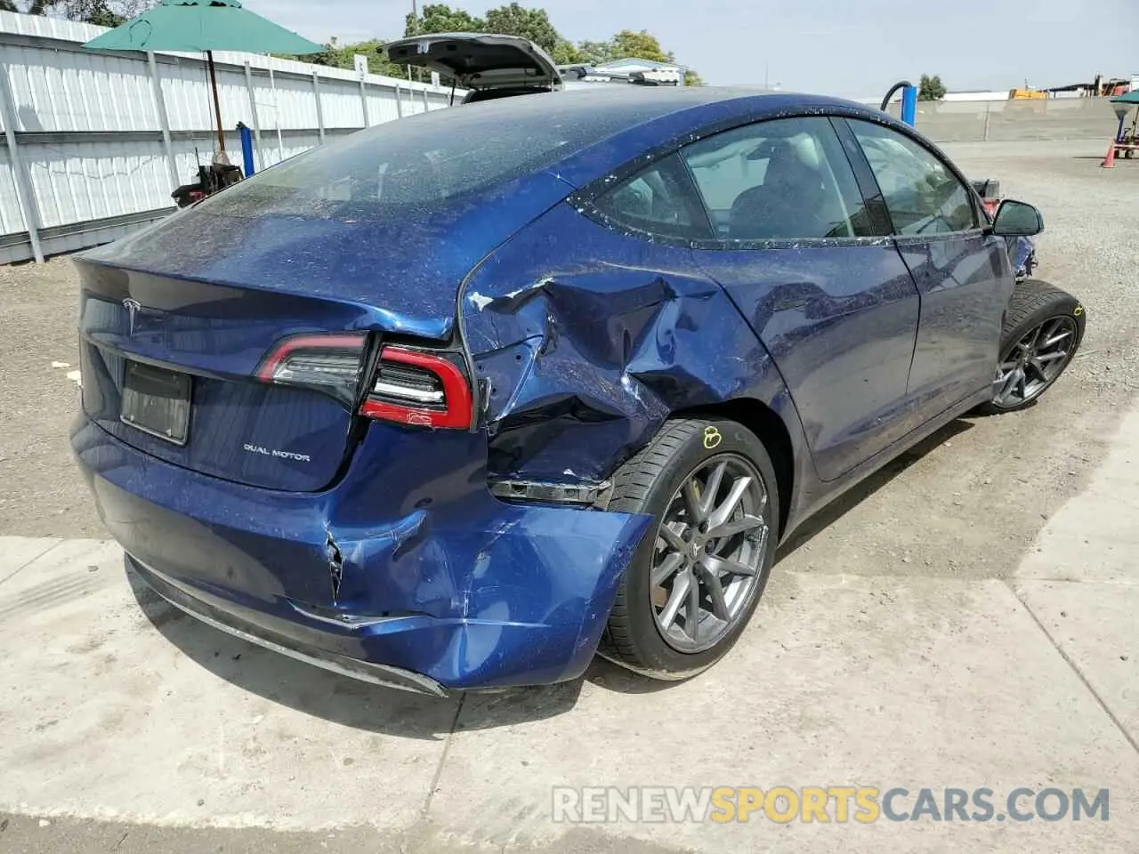 3 Photograph of a damaged car 5YJ3E1EB4NF335530 TESLA MODEL 3 2022