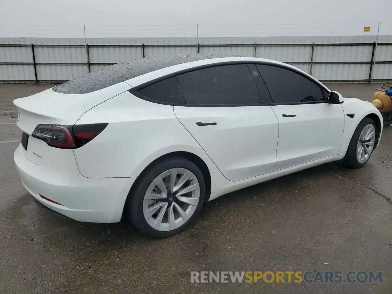 3 Photograph of a damaged car 5YJ3E1EB4NF337245 TESLA MODEL 3 2022