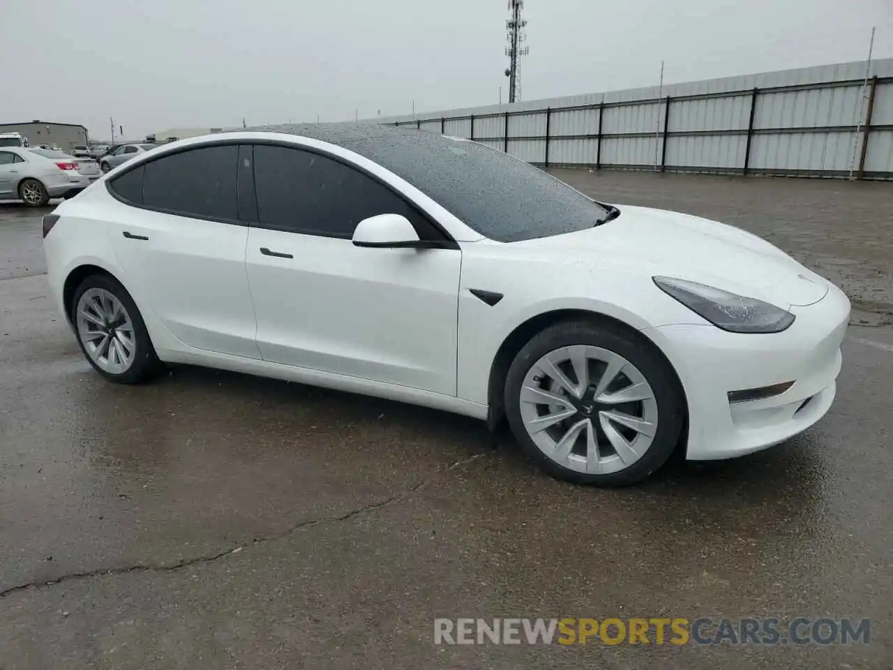 4 Photograph of a damaged car 5YJ3E1EB4NF337245 TESLA MODEL 3 2022