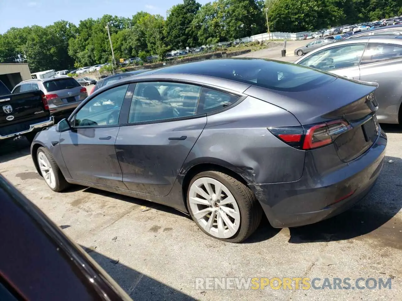 2 Photograph of a damaged car 5YJ3E1EB5NF105785 TESLA MODEL 3 2022