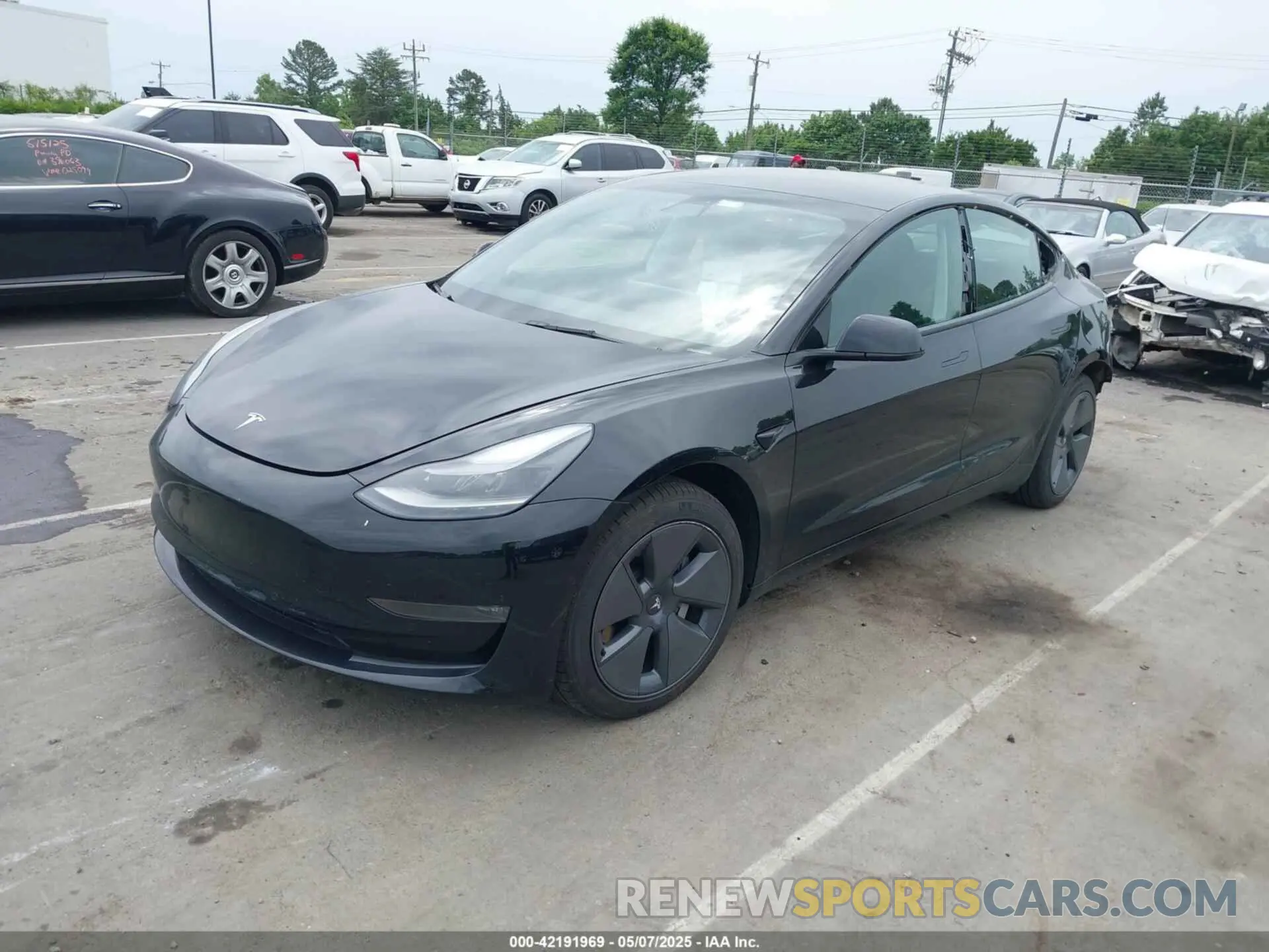 2 Photograph of a damaged car 5YJ3E1EB5NF117192 TESLA MODEL 3 2022