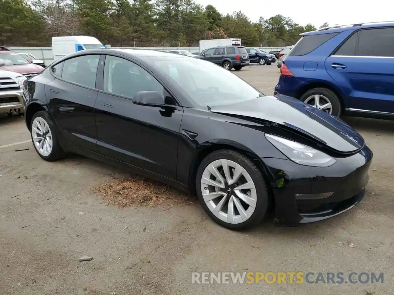 4 Photograph of a damaged car 5YJ3E1EB5NF123476 TESLA MODEL 3 2022