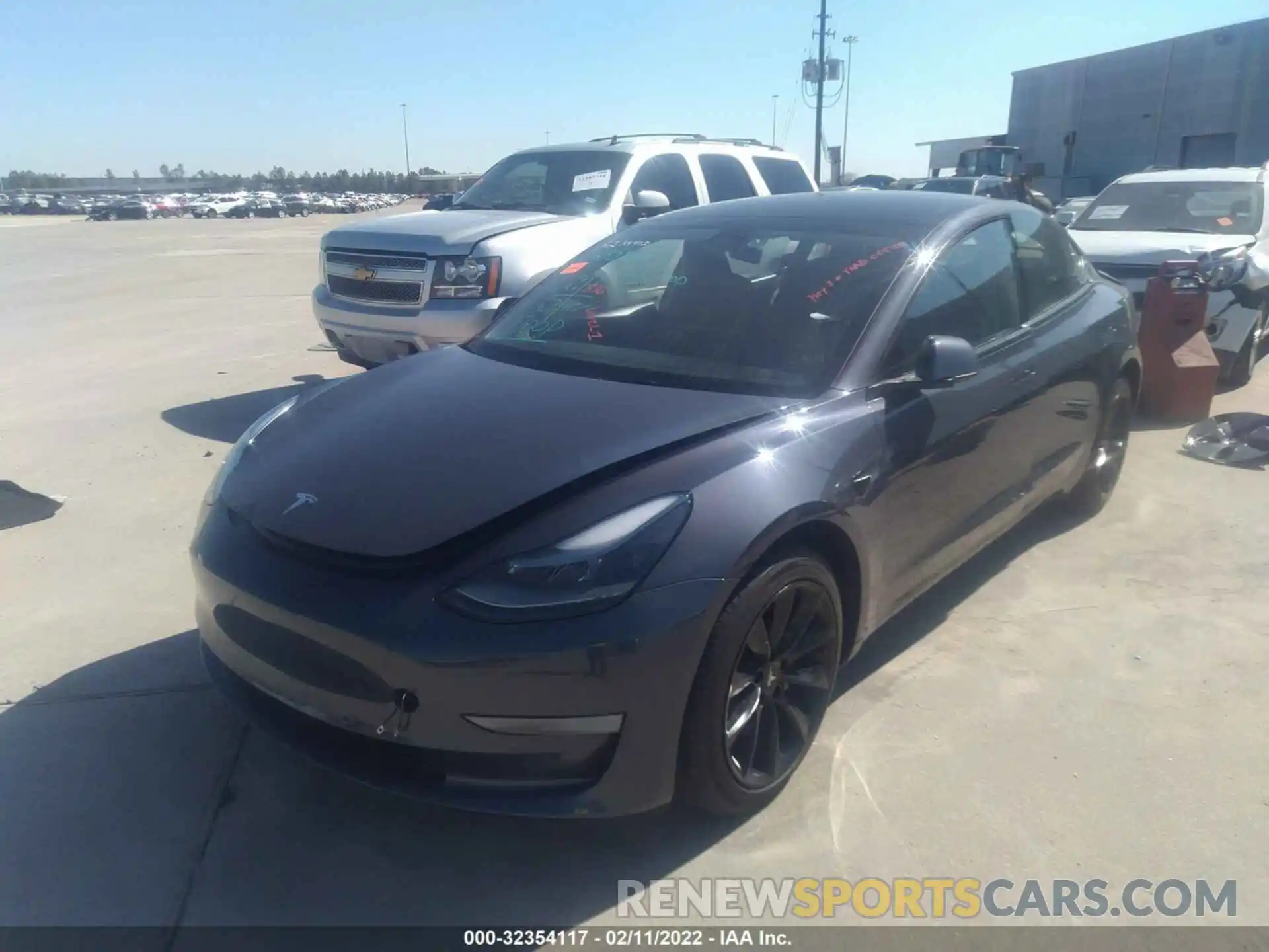 2 Photograph of a damaged car 5YJ3E1EB5NF128693 TESLA MODEL 3 2022