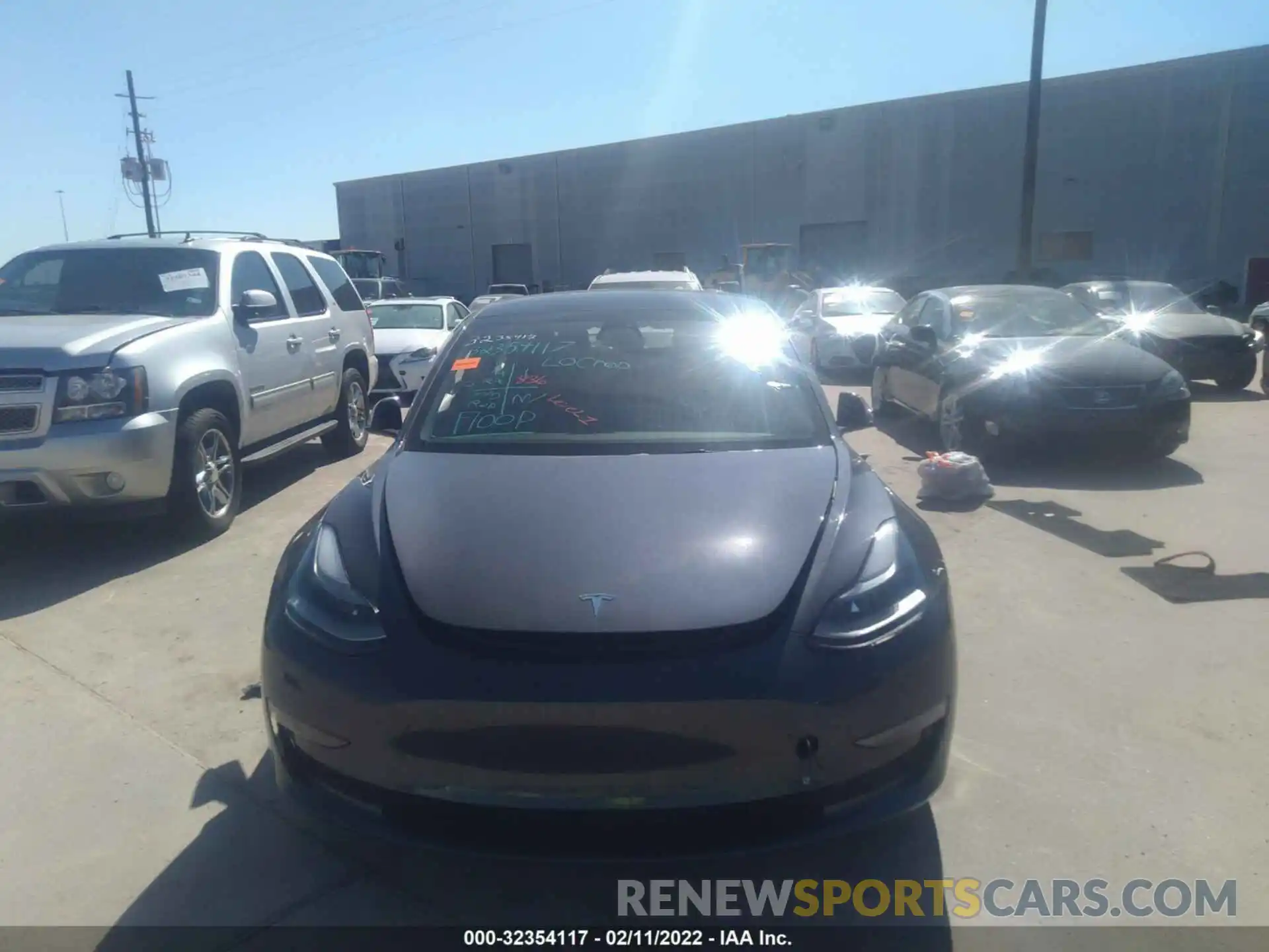 6 Photograph of a damaged car 5YJ3E1EB5NF128693 TESLA MODEL 3 2022