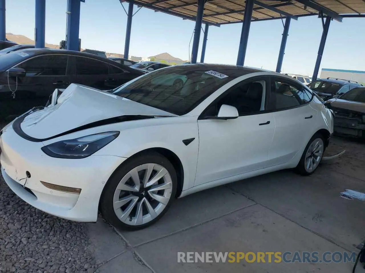 1 Photograph of a damaged car 5YJ3E1EB5NF129360 TESLA MODEL 3 2022