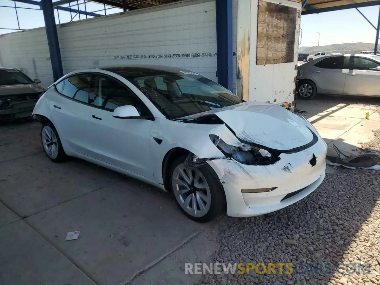 4 Photograph of a damaged car 5YJ3E1EB5NF129360 TESLA MODEL 3 2022
