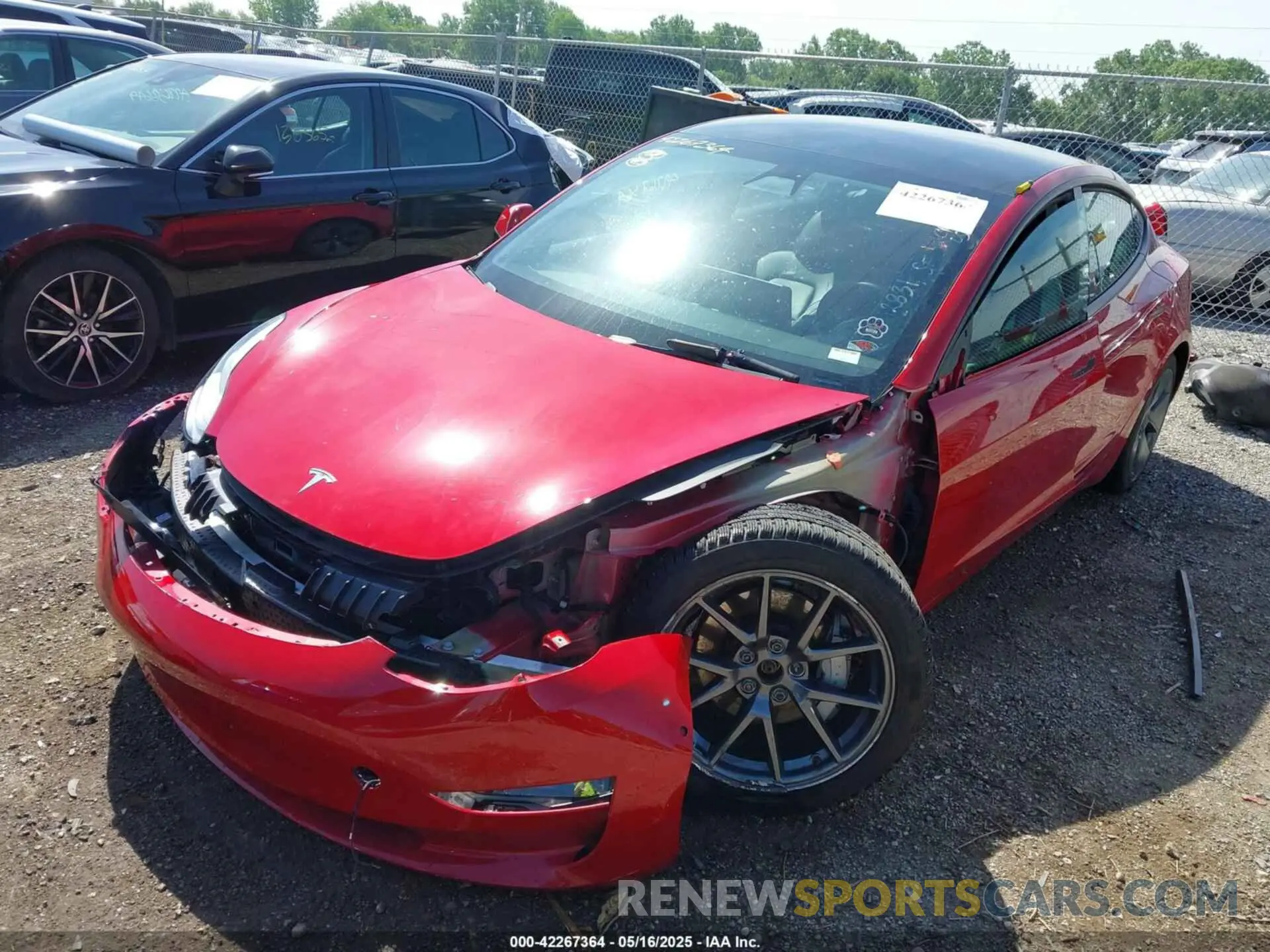 2 Photograph of a damaged car 5YJ3E1EB5NF135319 TESLA MODEL 3 2022