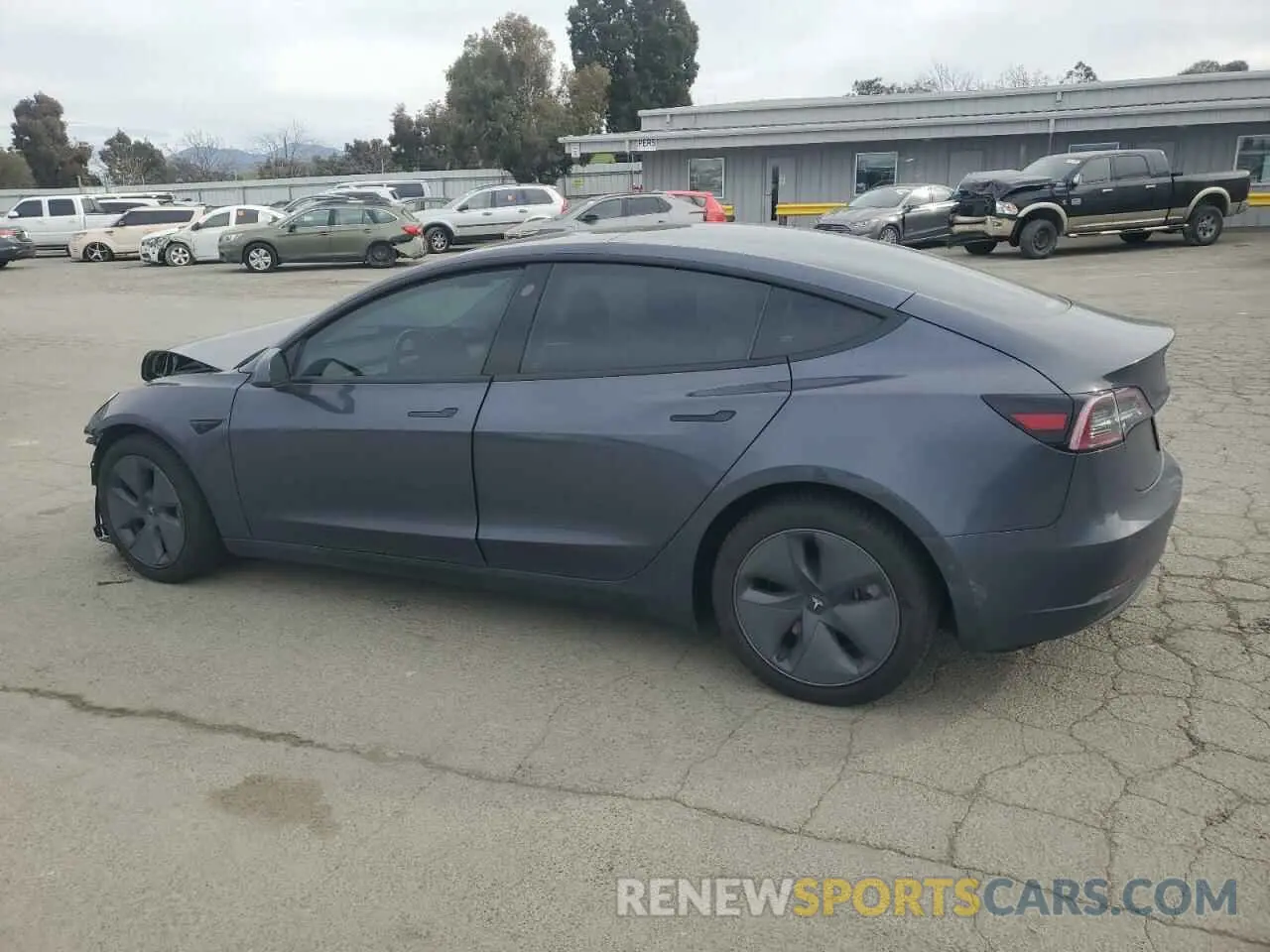 2 Photograph of a damaged car 5YJ3E1EB5NF135577 TESLA MODEL 3 2022