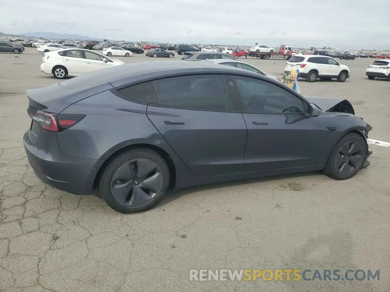 3 Photograph of a damaged car 5YJ3E1EB5NF135577 TESLA MODEL 3 2022