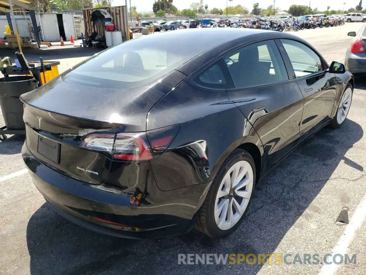 4 Photograph of a damaged car 5YJ3E1EB5NF145767 TESLA MODEL 3 2022