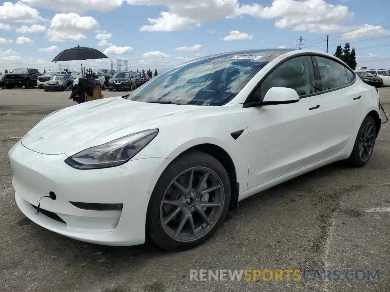 1 Photograph of a damaged car 5YJ3E1EB5NF166957 TESLA MODEL 3 2022