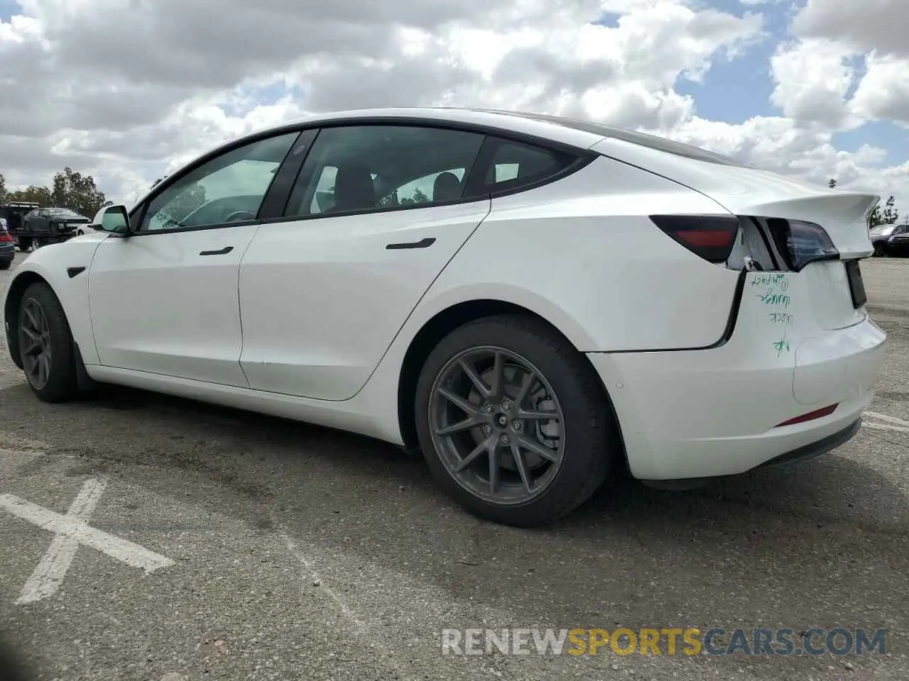 2 Photograph of a damaged car 5YJ3E1EB5NF166957 TESLA MODEL 3 2022