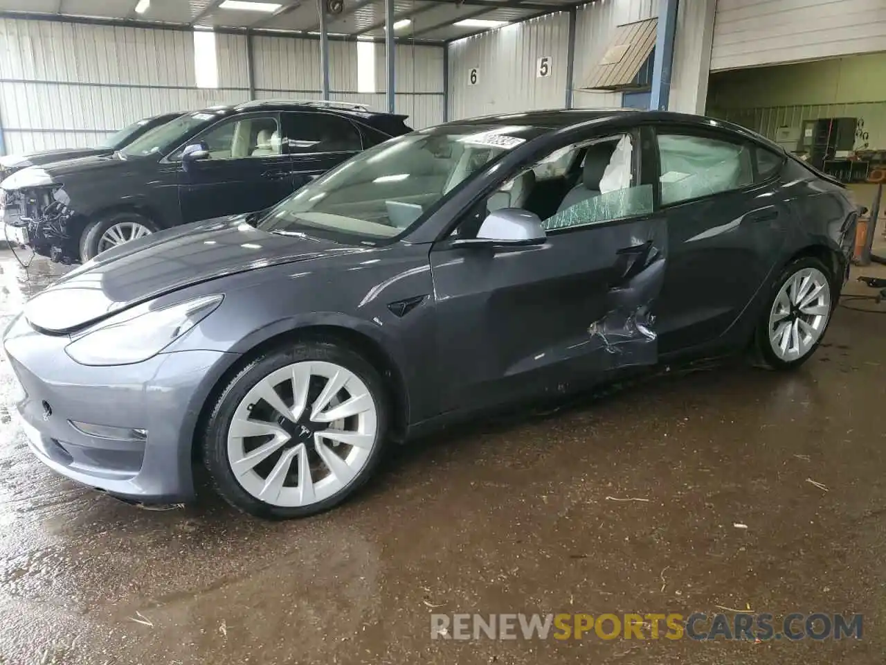 1 Photograph of a damaged car 5YJ3E1EB5NF174301 TESLA MODEL 3 2022