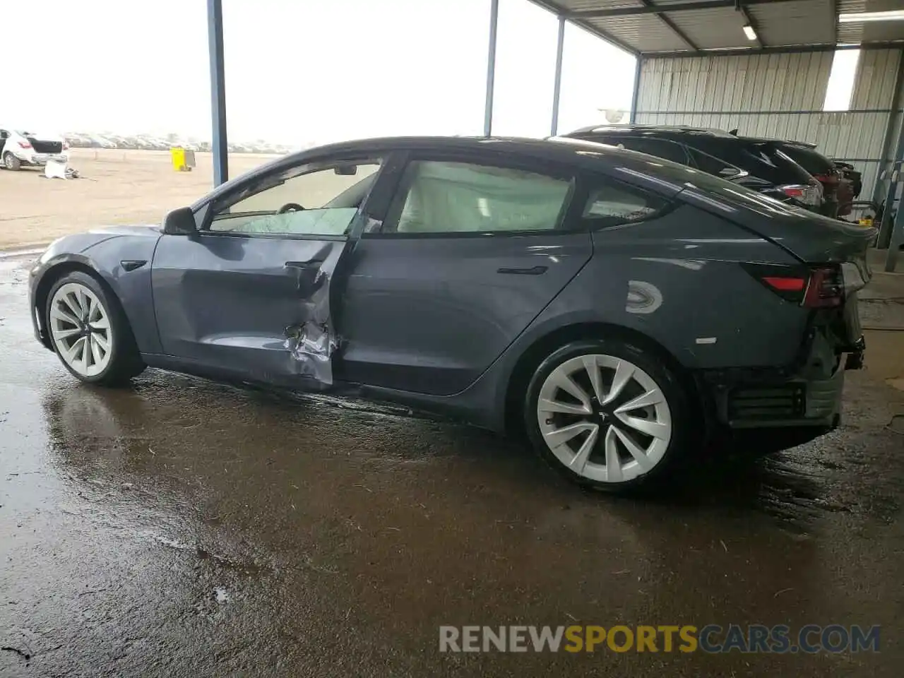 2 Photograph of a damaged car 5YJ3E1EB5NF174301 TESLA MODEL 3 2022