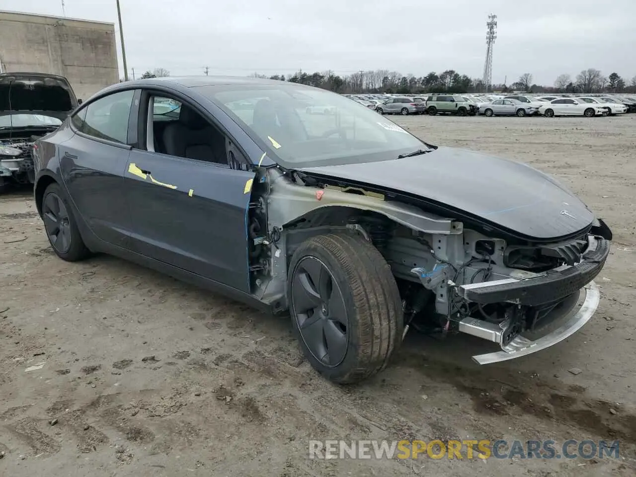 4 Photograph of a damaged car 5YJ3E1EB5NF179157 TESLA MODEL 3 2022