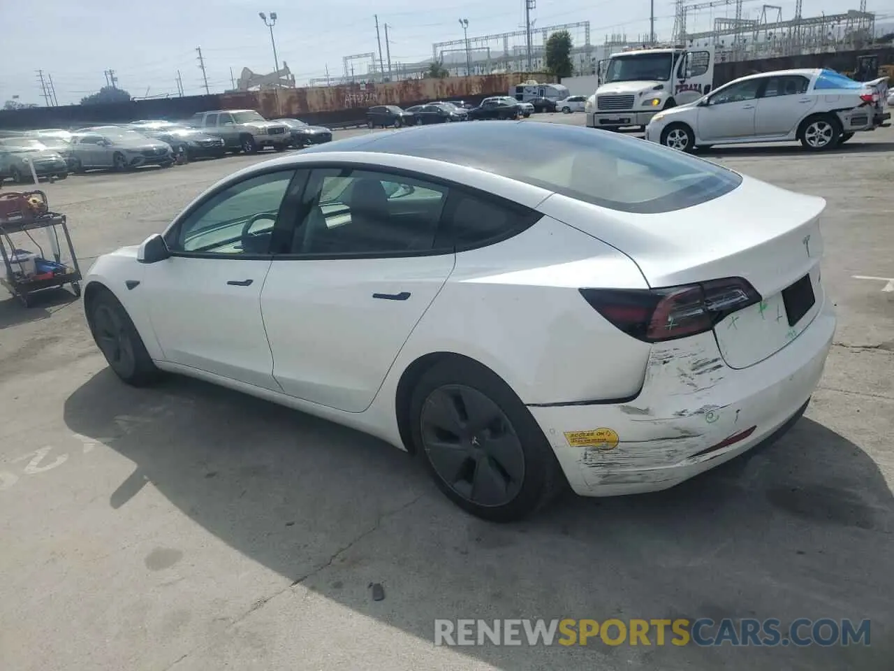 2 Photograph of a damaged car 5YJ3E1EB5NF184262 TESLA MODEL 3 2022