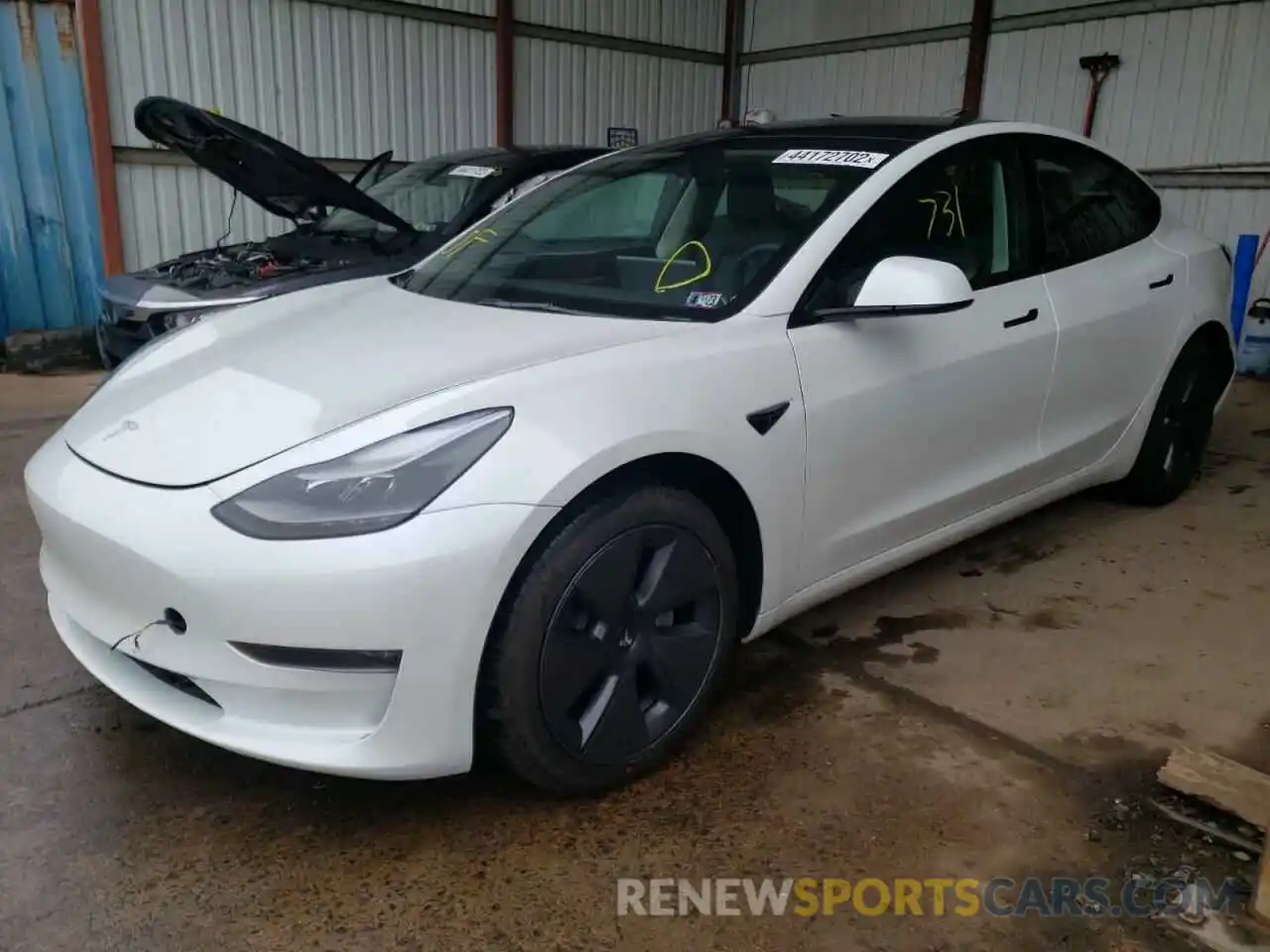 2 Photograph of a damaged car 5YJ3E1EB5NF193138 TESLA MODEL 3 2022