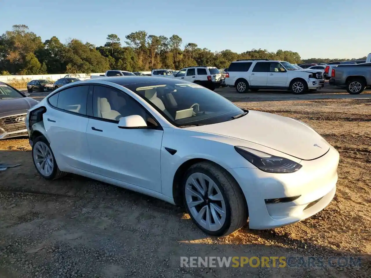 4 Photograph of a damaged car 5YJ3E1EB5NF200590 TESLA MODEL 3 2022