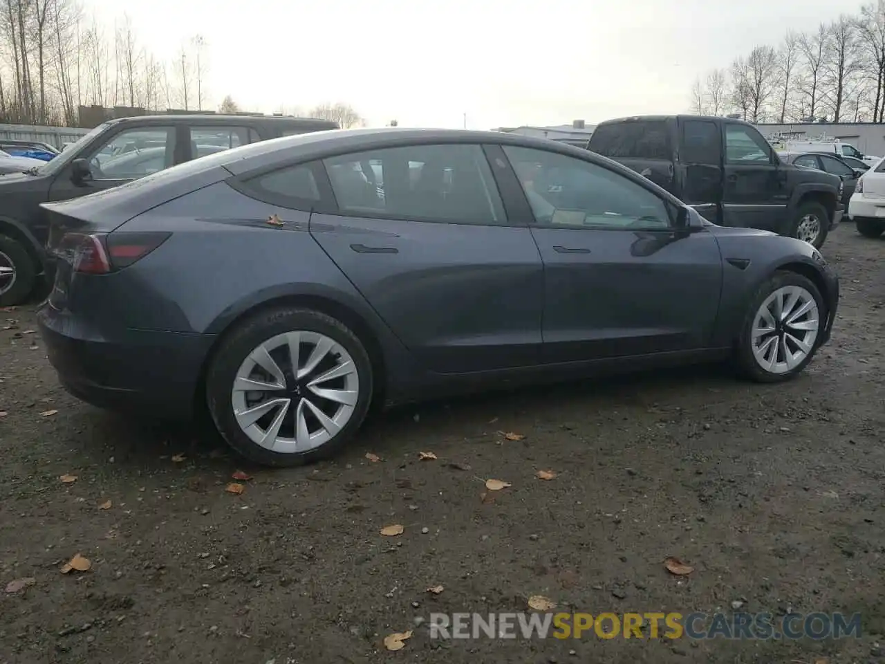 3 Photograph of a damaged car 5YJ3E1EB5NF209175 TESLA MODEL 3 2022