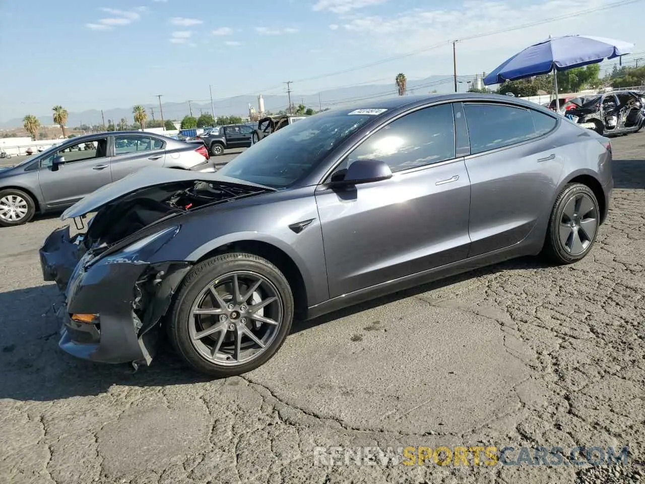1 Photograph of a damaged car 5YJ3E1EB5NF221746 TESLA MODEL 3 2022