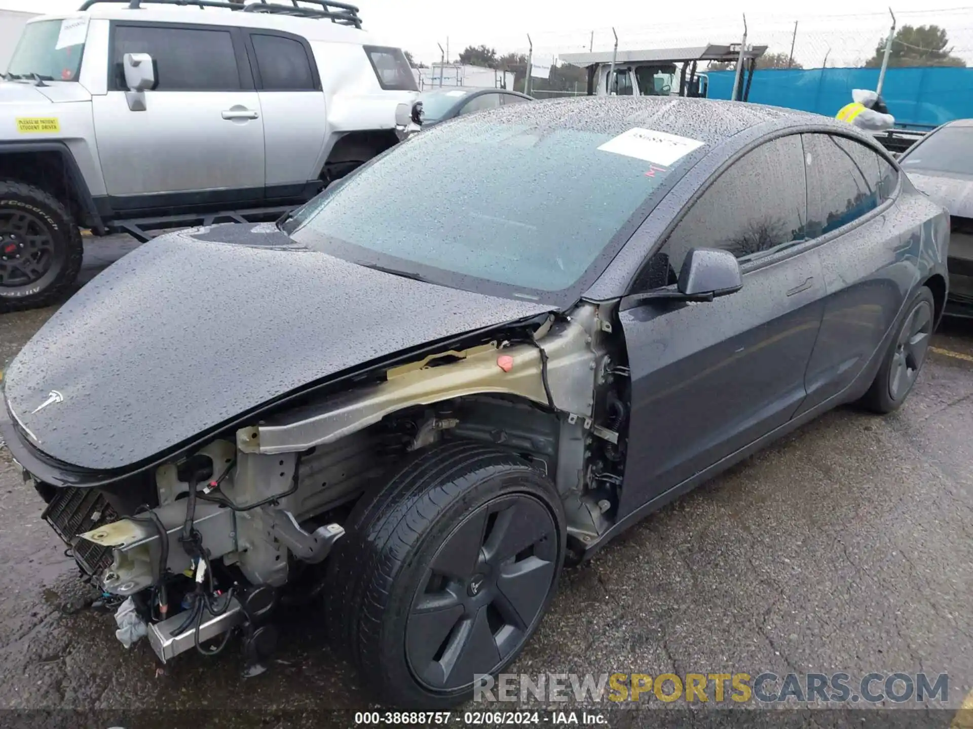 2 Photograph of a damaged car 5YJ3E1EB5NF221990 TESLA MODEL 3 2022