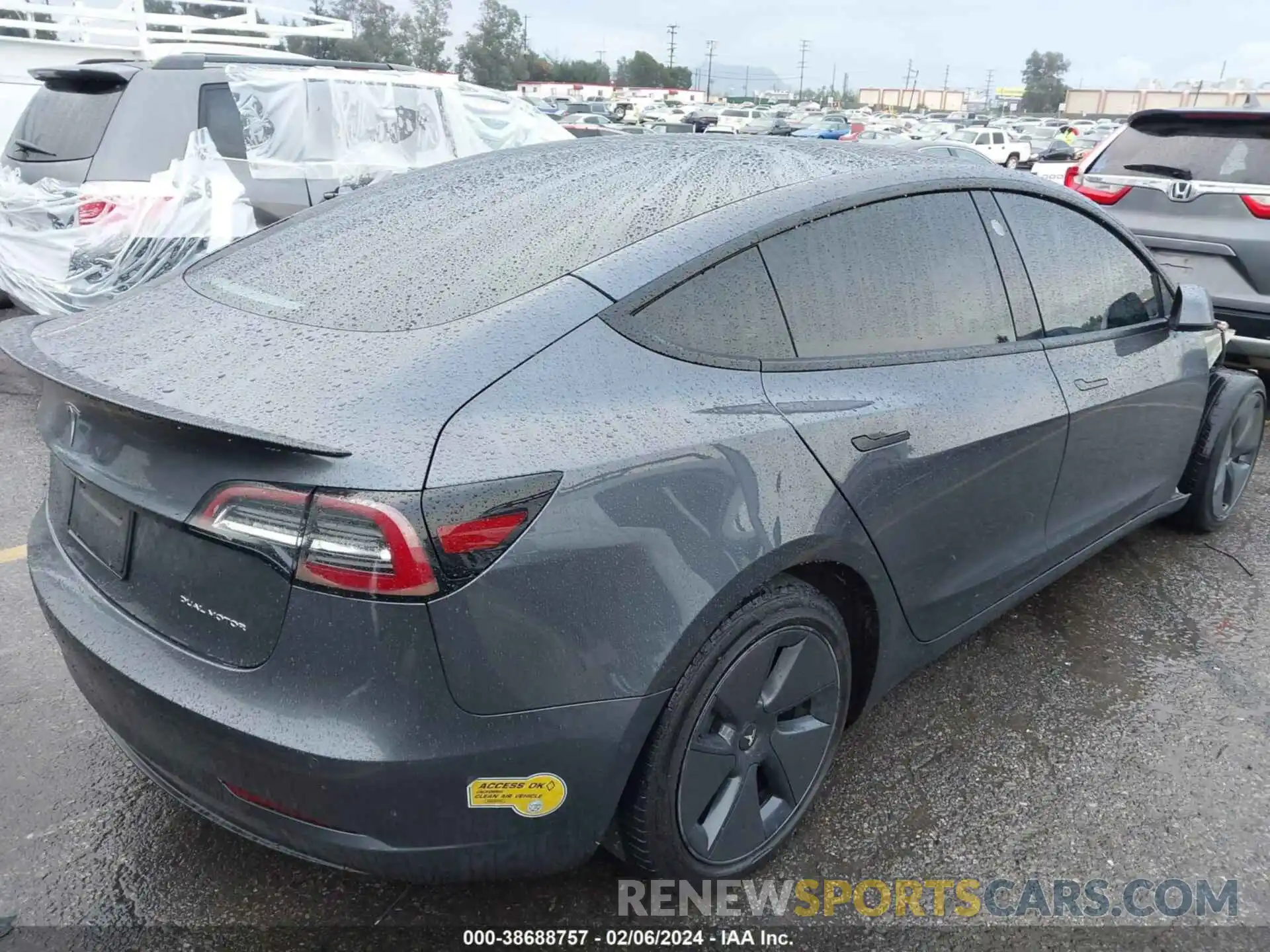 4 Photograph of a damaged car 5YJ3E1EB5NF221990 TESLA MODEL 3 2022