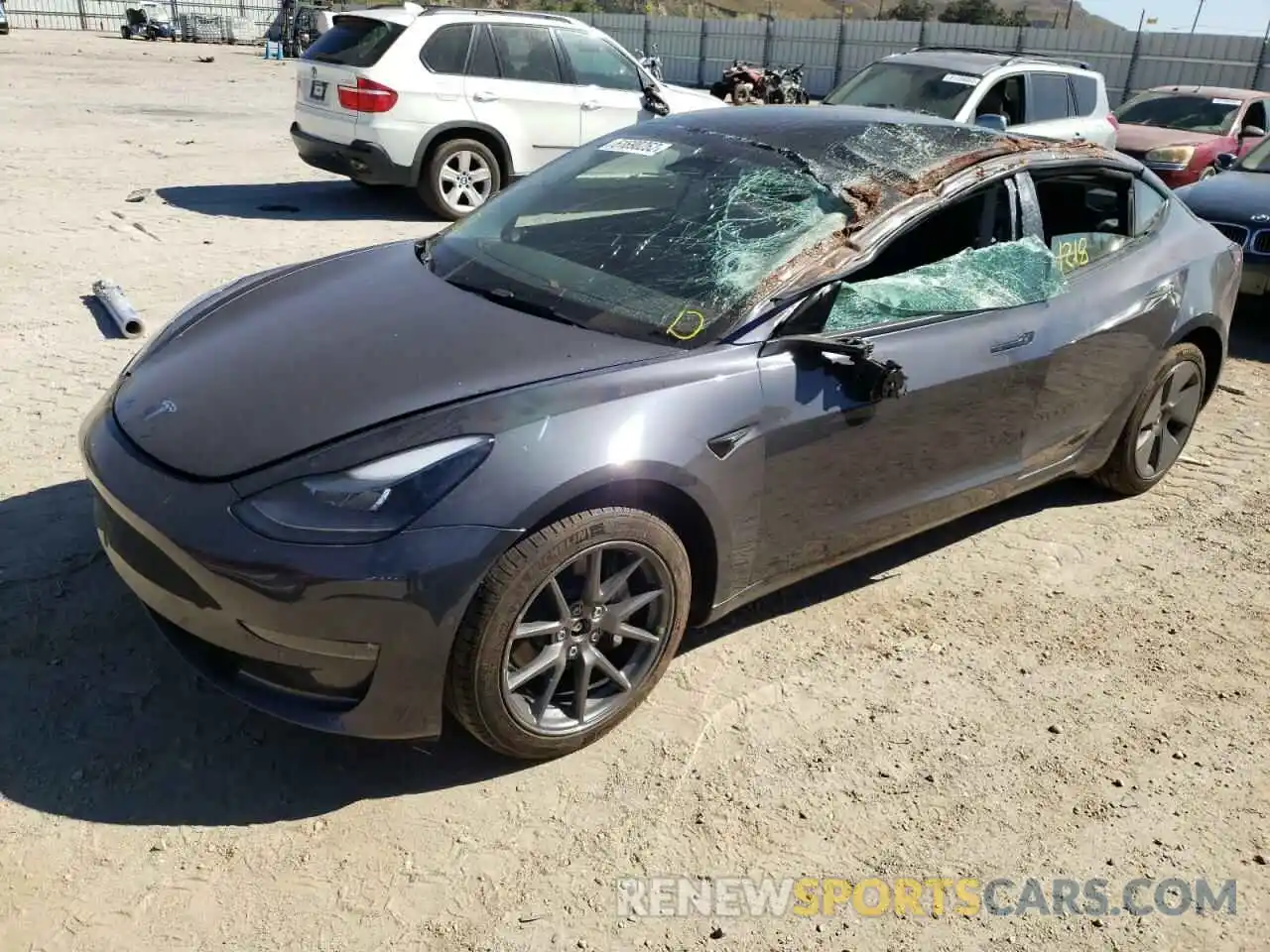 2 Photograph of a damaged car 5YJ3E1EB5NF237297 TESLA MODEL 3 2022