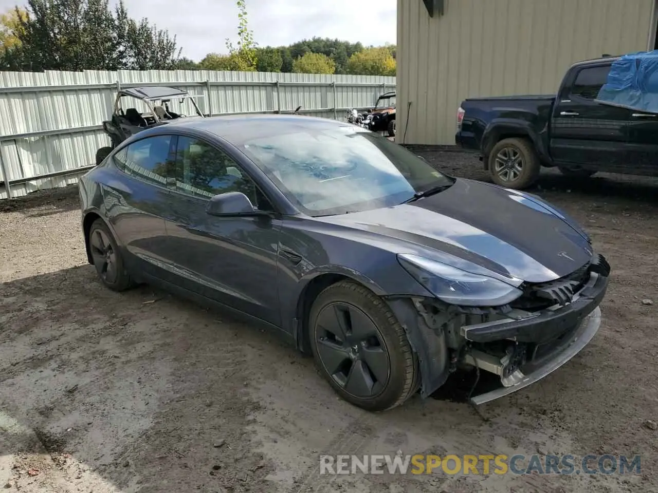 4 Photograph of a damaged car 5YJ3E1EB5NF266606 TESLA MODEL 3 2022