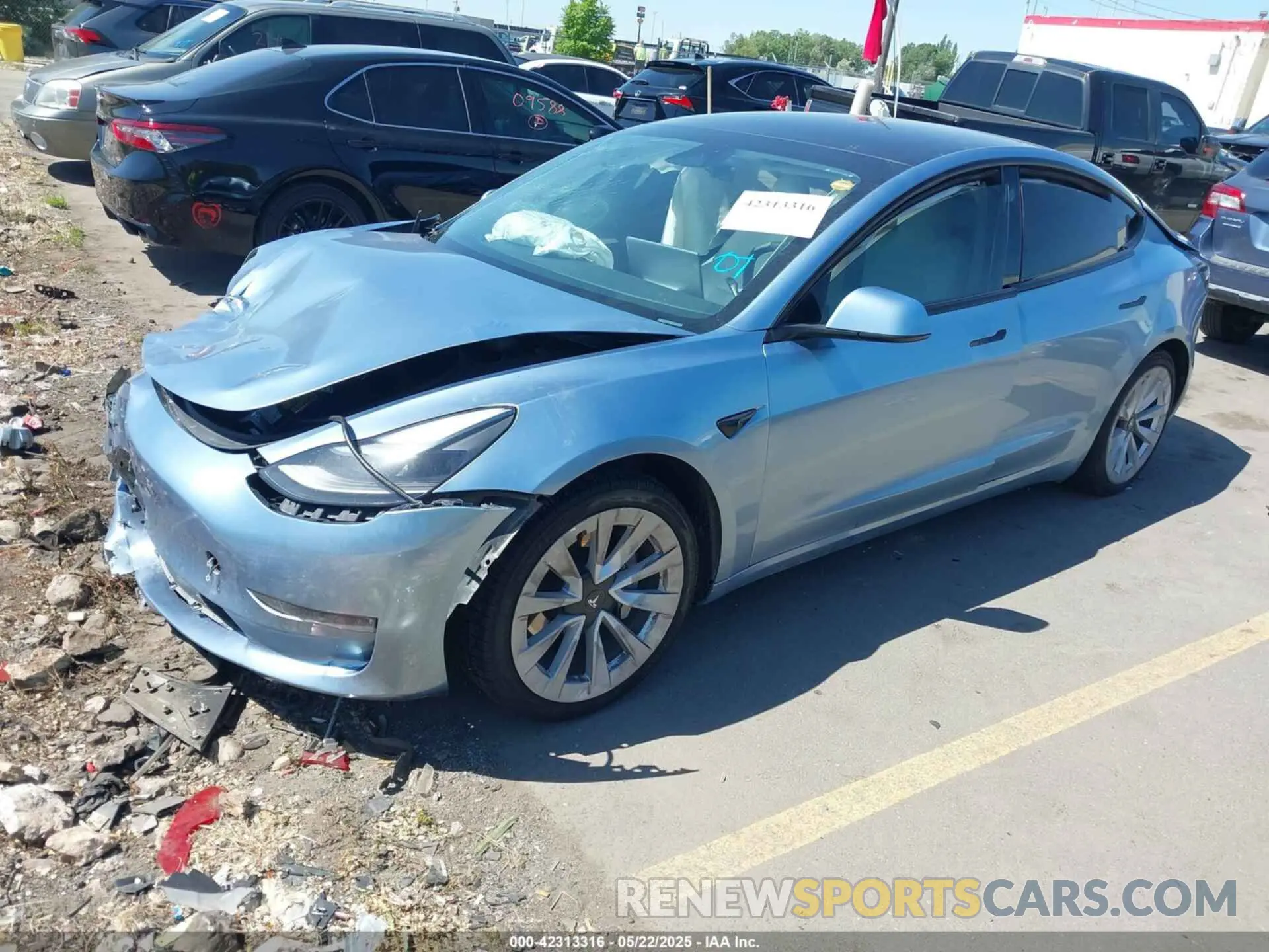 2 Photograph of a damaged car 5YJ3E1EB5NF270106 TESLA MODEL 3 2022