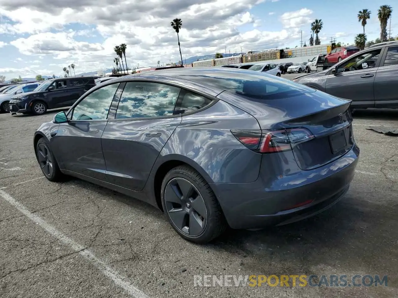 2 Photograph of a damaged car 5YJ3E1EB5NF271921 TESLA MODEL 3 2022