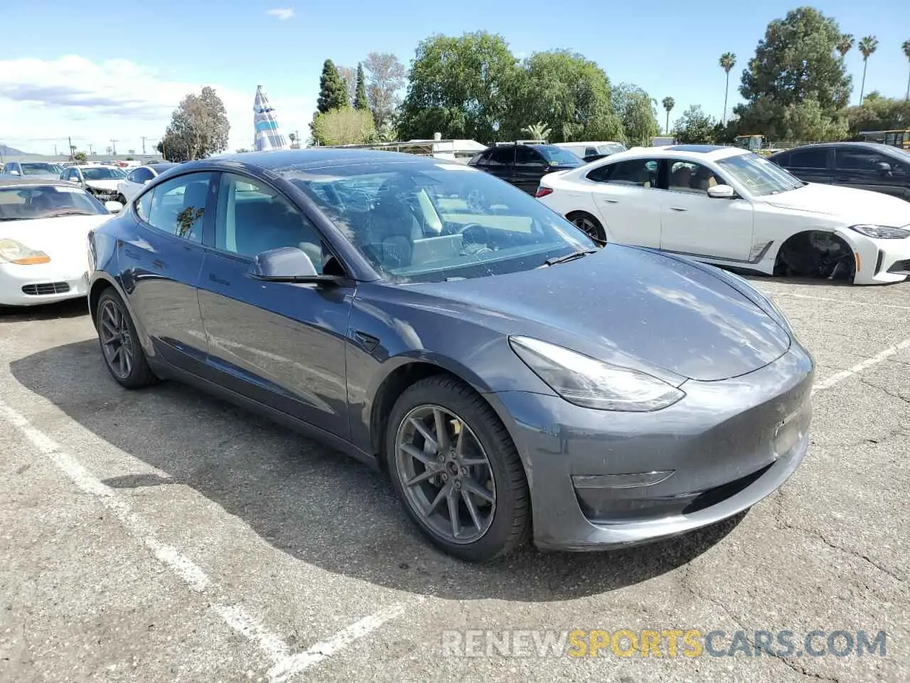 4 Photograph of a damaged car 5YJ3E1EB5NF271921 TESLA MODEL 3 2022