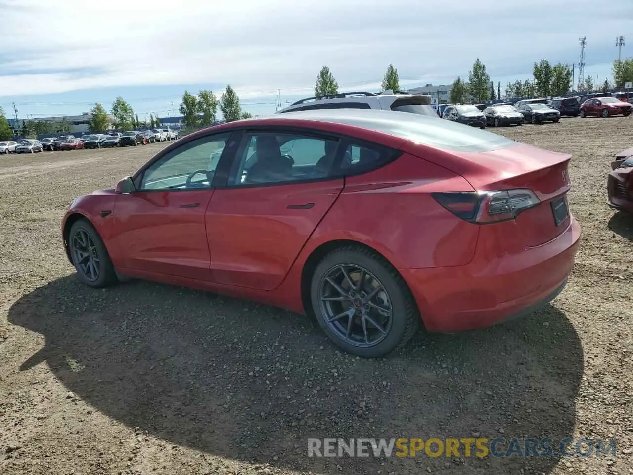 2 Photograph of a damaged car 5YJ3E1EB5NF273586 TESLA MODEL 3 2022