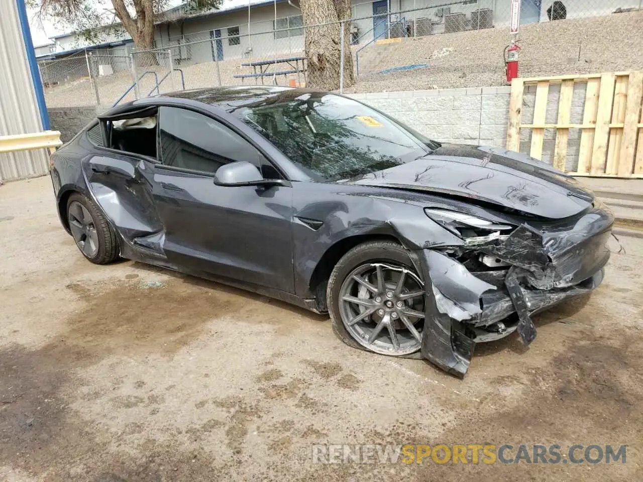 4 Photograph of a damaged car 5YJ3E1EB5NF277024 TESLA MODEL 3 2022