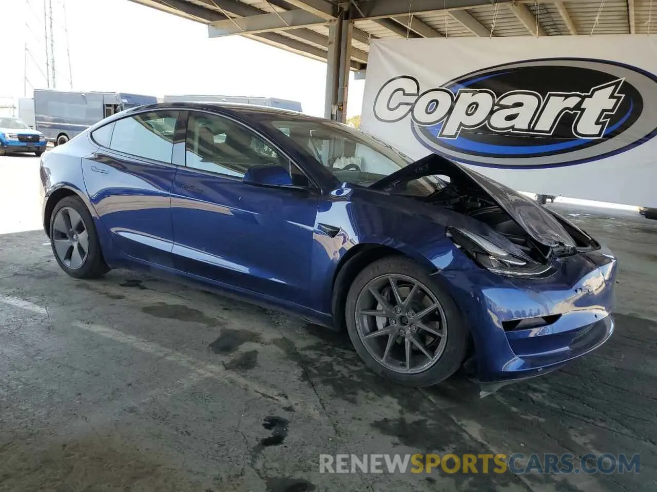 4 Photograph of a damaged car 5YJ3E1EB5NF314721 TESLA MODEL 3 2022