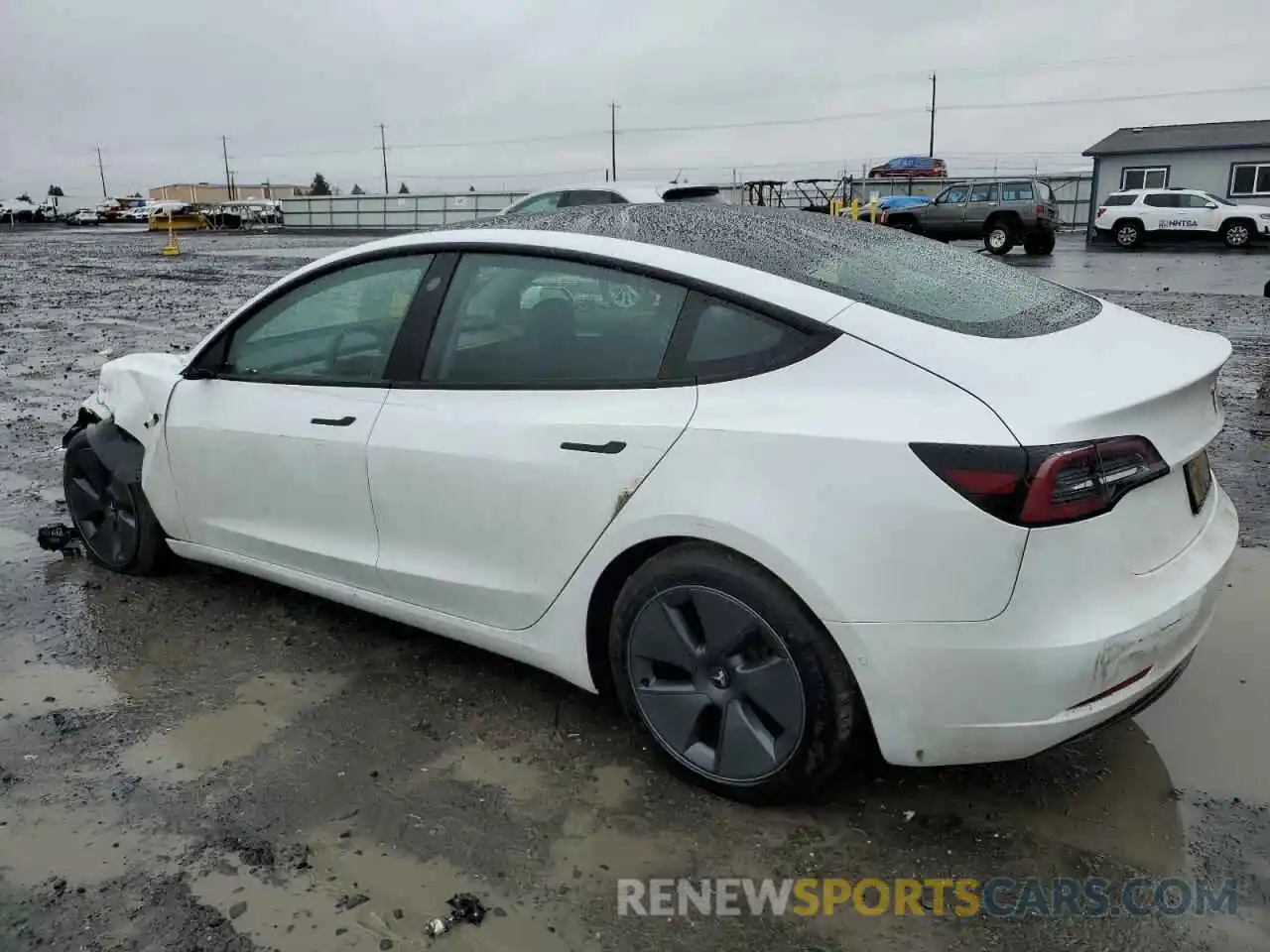 2 Photograph of a damaged car 5YJ3E1EB5NF316419 TESLA MODEL 3 2022