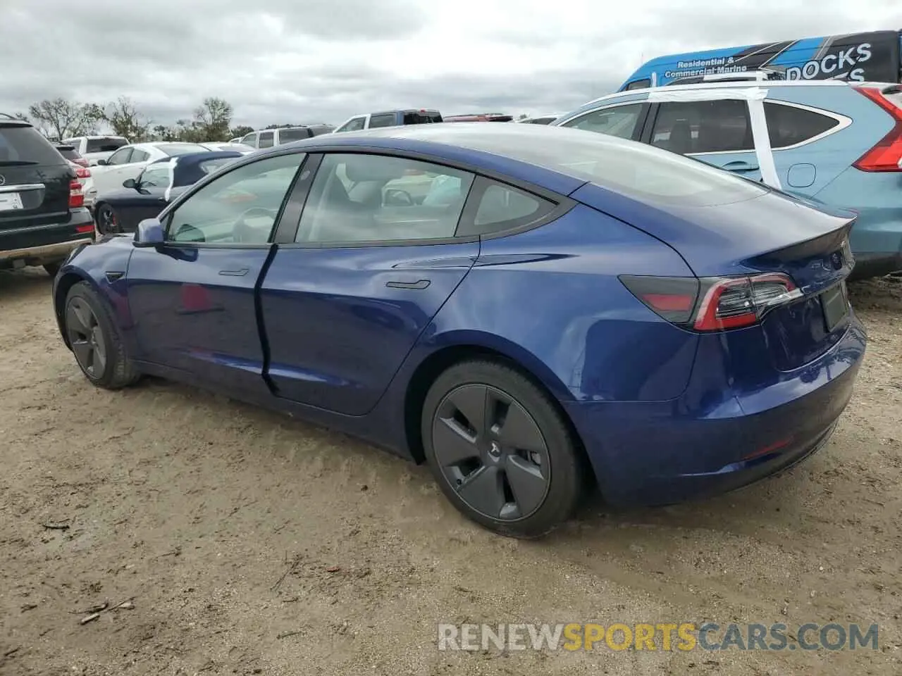 2 Photograph of a damaged car 5YJ3E1EB5NF334399 TESLA MODEL 3 2022